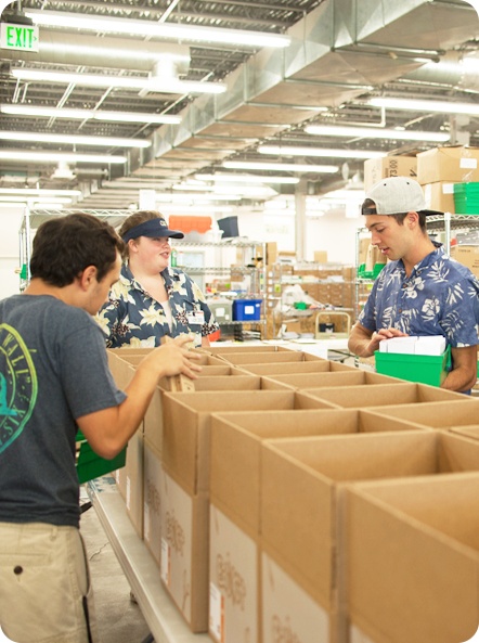 Packing Bundles of School Supplies in the Warehouse